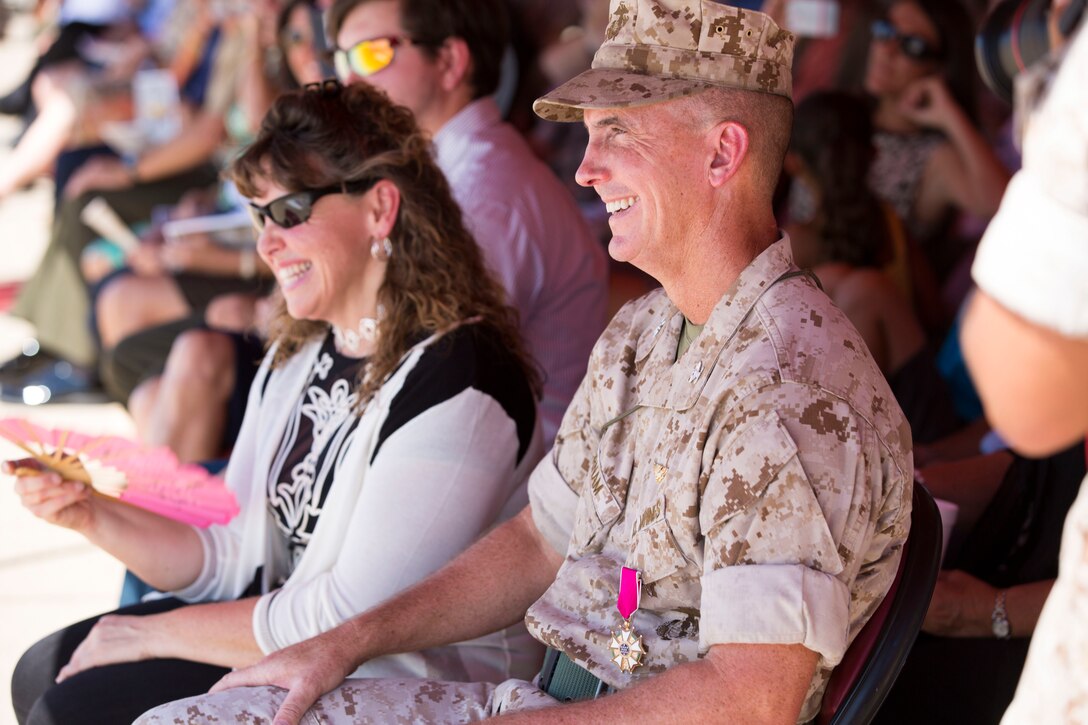 Col. John Farnam, former commanding officer of Marine Corps Air Station Miramar, California, listens watches the change of command ceremony aboard the air station, Aug. 28. The change of command also marks the end of Farnam's approximately 25 years of active service in the Marine Corps.
