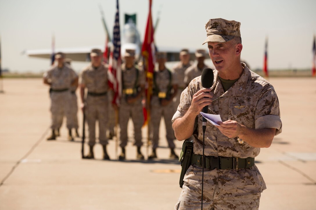 Col. John Farnam, former commanding officer of Marine Corps Air Station Miramar, California, speaks to service members and guests during the air station's change of command ceremony, Aug. 28. The change of command also marks the end of Farnam's approximately 25 years of active service in the Marine Corps.