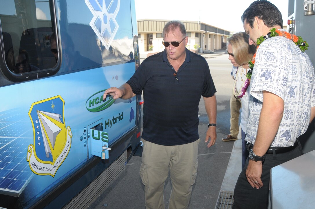 The Honorable Miranda A. Ballentine, assistant secretary of the Air Force for Installations, Environment, and Energy, and U.S. Senator Brian Schatz are shown the hydrogen refueling process by Gene Hughes, Service and Operations Manager for U.S. Hybrid Corporation during a tour of the Hawaii Center for Advanced Transportation Technologies, Aug. 26, 2015, Joint Base Pearl Harbor-Hickam. The Air Force in partnership with the state of Hawaii established a National Demonstration Center to facilitate demonstration and validation of the latest fuel efficient and environmentally compliant technologies for use in Air Force ground vehicles, support equipment, base infrastructure, and basic expeditionary airfield resources. (U.S. Air National Guard photo by Senior Master Sgt. Kristen Stanley /released)