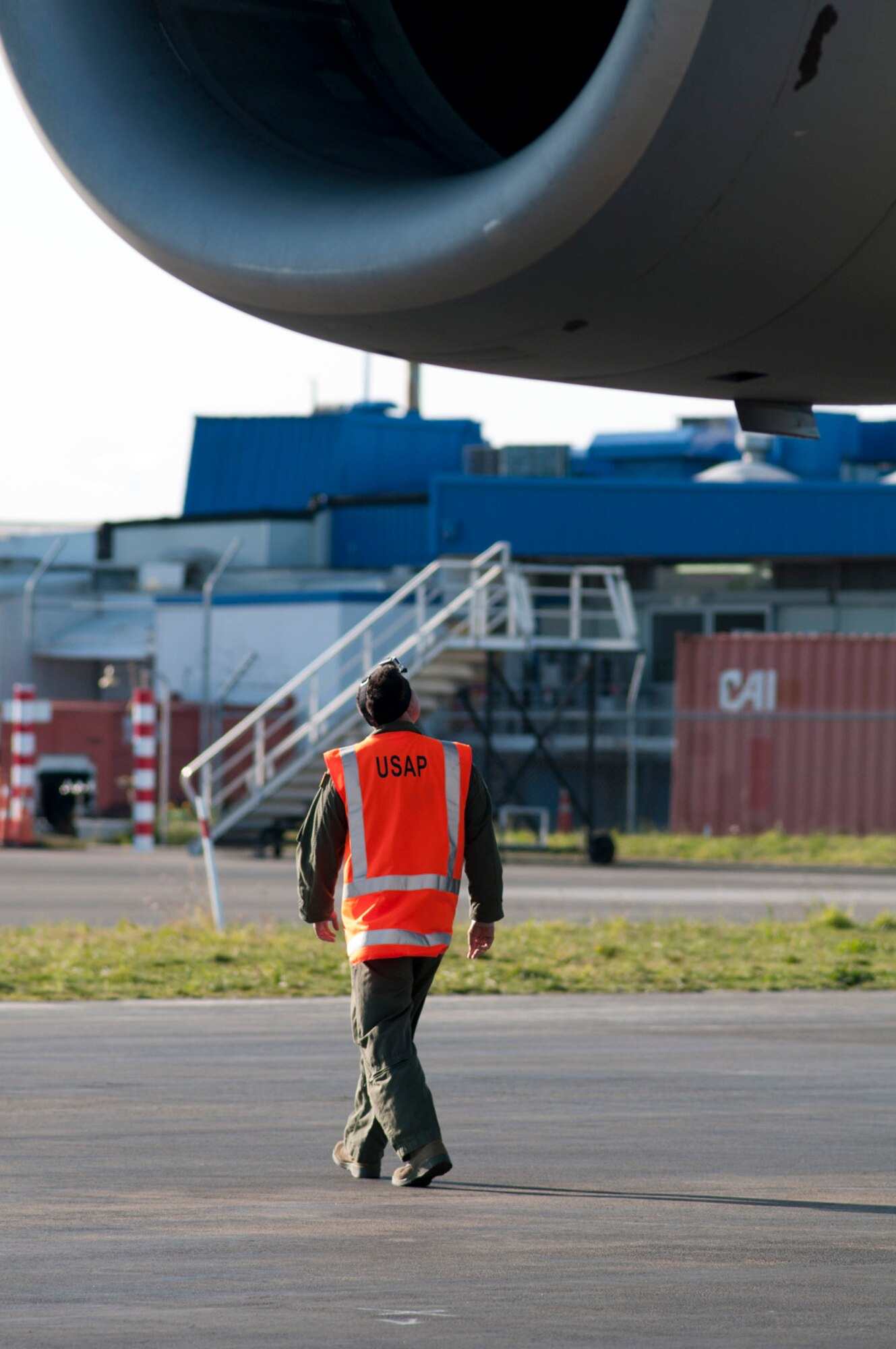 U.S. Air Force Staff Sergeant Andreux Betancourt, 304th Expeditionary Airlift Squadron flying crew chief, does a walk-around of a U.S. Air Force C-17 Globemaster III after landing at Christchurch International Airport, New Zealand, Aug. 21, 2015. The aircraft needs to be in perfect condition before takeoff, because of the austere Antarctic climate and the minimal divert options. (U.S. Air Force photo by Senior Airman Madelyn McCullough)