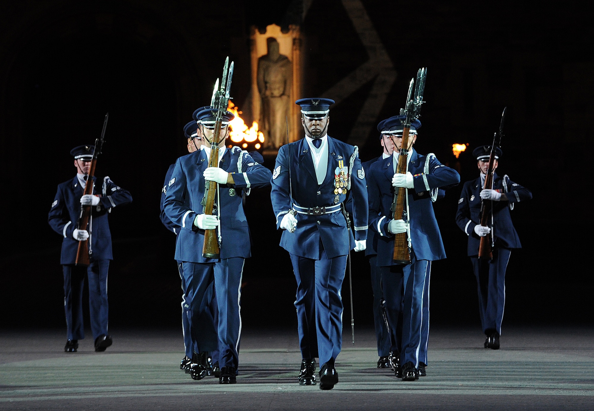 The United States Air Force Honor Guard Drill Team performs during The Royal Edinburgh Military Tattoo on the Esplanade of the Edinburgh Castle in Edinburgh; Scotland Aug. 17; 2015. This is the 66th production of the tattoo and it welcomes more than 220; 000 spectators from around the world for more than 3 weeks. (U.S. Air Force photo/Staff Sgt. Nichelle Anderson/Released)