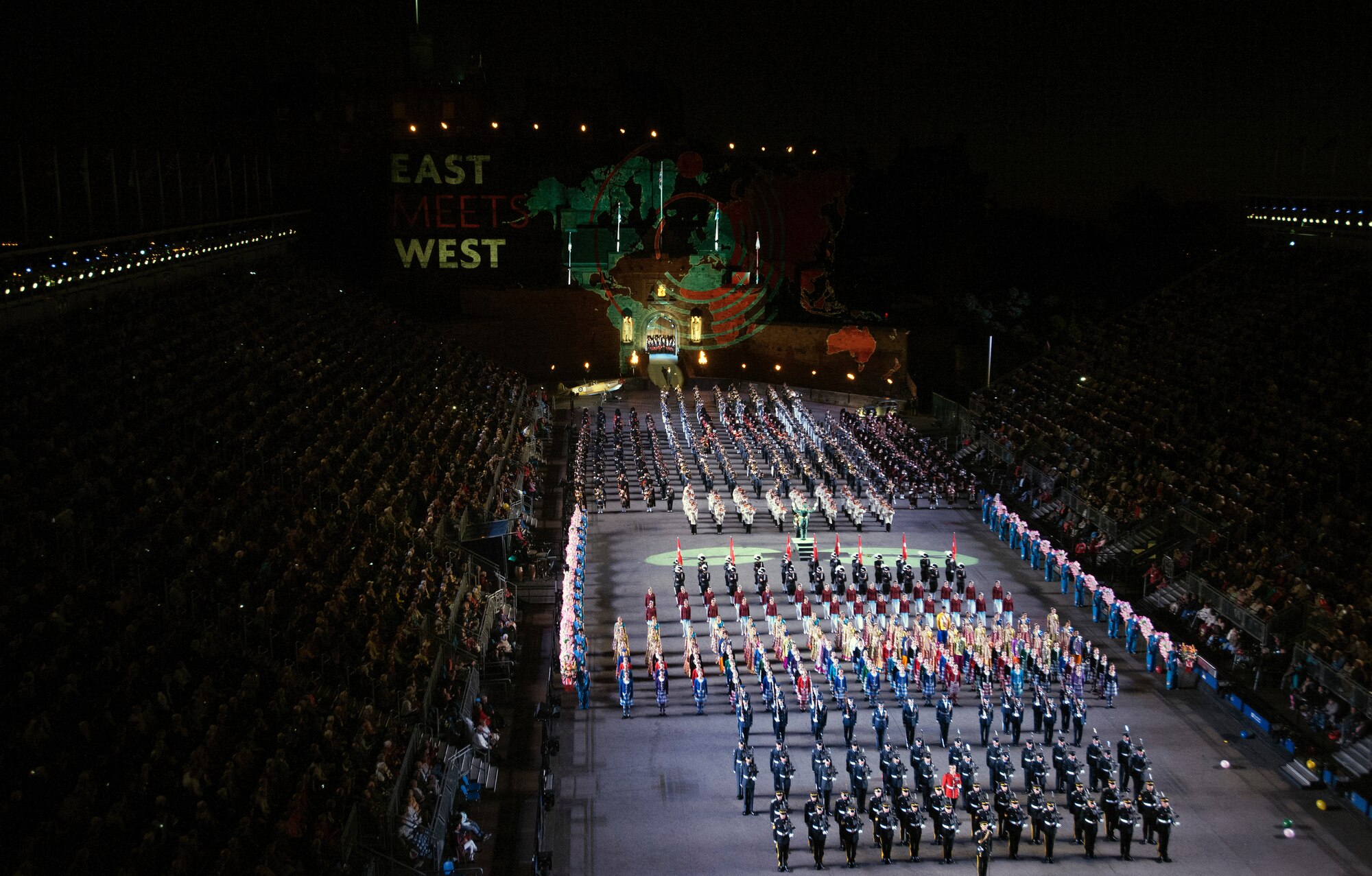 Performers stand in formation during the Royal Edinburgh Military Tattoo on the Esplanade of the Edinburgh Castle in Edinburgh, Scotland Aug. 6, 2015. The 66th production of the tattoo welcomes more than 220,000 spectators from around the world for more than 3 weeks. The event includes 17 acts for 25 performances and welcomes more than 1,390 performers from the US, Europe, Asia, Australia and Canada. The show features Bollywood dancers from India, the Military Band of the People’s Liberation Army of China, the Top Secret Drum Corps from Switzerland, the Royal Air Force and Queen’s Colour Squadron Mass Band and more. (U.S. Air Force photo/Staff Sgt. Nichelle Anderson/Released)