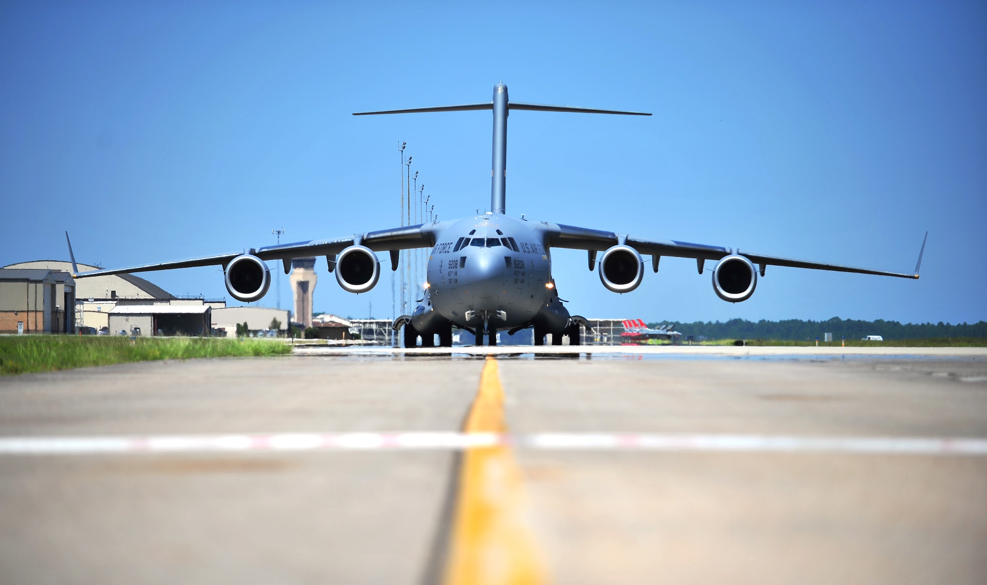 A C-17 Globemaster III filled with Airmen and cargo from Tyndall Air Force Base, Fla. taxies on the Tyndall flightline. The cargo and Airmen will be part of the first-ever F-22 Raptor deployment to Europe that will allow for F-22 pilots to train alongside joint partners, NATO allies and other U.S. Air Force aircraft. (U.S. Air Force photo by Airman 1st Class Dustin Mullen/Released)