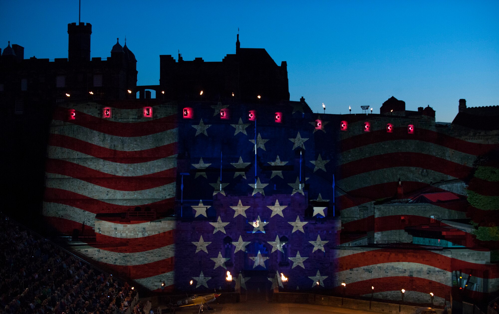 Red, white and blue stars and stripes light up the Edinburgh Castle during the Royal Edinburgh Military Tattoo in Edinburgh, Scotland, Aug. 11, 2015. The castle was lit to depict the American flag during a performance by the Citadel Regimental Band and Pipes symbolizing U.S. participating in the military tattoo. The Citadel band represented the U.S. alongside the U.S. Air Force Honor Guard Drill Team during the tattoo Aug. 7-29. The Citadel is a Military College located in Charleston, S.C. (U.S. Air Force Photo/Staff Sgt. Nichelle Anderson/released)