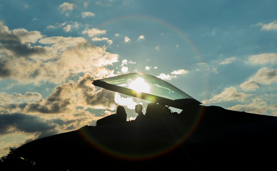A member of the 95th Fighter Squadron at Tyndall Air Force Base, Fla., sits in the cockpit of an F-22 Raptor fighter aircraft at Spangdahlem Air Base, Germany, Aug. 28, 2015. The U.S. Air Force deployed four F-22 Raptors, one C-17 Globemaster III and more than 50 Airmen to Spangdahlem in support of the first F-22 European training deployment. The inaugural F-22 training deployment to Europe is funded by the European Reassurance Initiative, a $1 billion pledge announced by President Obama in March 2014.(U.S. Air Force photo by Airman 1st Class Luke Kitterman/Released)