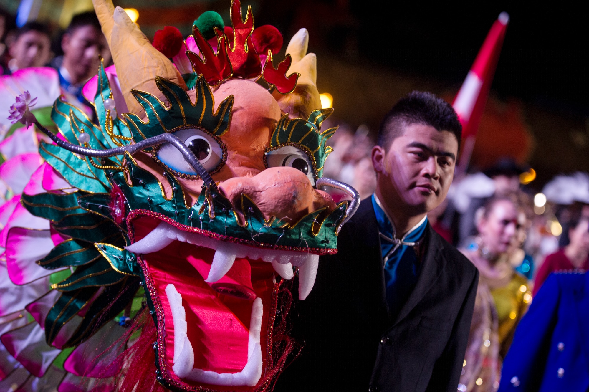 Changxing Lotus Dragon Folklord Group dancer stands in formation during the Royal Edinburg Military Tattoo, Aug. 12, 2015. The award-winning group from Changxing, China is made up of 65 performers. (U.S. Air Force photo/Staff Sgt. Nichelle Anderson/released)