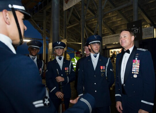 Maj. Gen. Darryl Burke, Air Force District of Washington commander, meets with members of the United States Air Force Honor Guard Drill Team in Edinburgh, Scotland, Aug. 14, 2015. Twenty members of the U.S. Honor Guard Drill team traveled to the United Kingdom to represent the USAF and the Department of Defense as the only branch of military service from the U.S. performing in the Royal Edinburgh Military Tattoo. The 66th production of the tattoo welcomed more than 220,000 spectators from around the world for a span of more than three weeks. (U.S. Air Force photo/Staff Sgt. Nichelle Anderson/released)