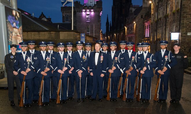 Maj. Gen. Darryl Burke, Air Force District of Washington commander, meets with members of the United States Air Force Honor Guard Drill Team in Edinburgh, Scotland, Aug. 14, 2015. Twenty members of the U.S. Honor Guard Drill team traveled to the United Kingdom to represent the USAF and the Department of Defense as the only branch of military service from the U.S. performing in the Royal Edinburgh Military Tattoo. The 66th production of the tattoo welcomed more than 220,000 spectators from around the world for a span of more than three weeks. (U.S. Air Force photo/Staff Sgt. Nichelle Anderson/released)