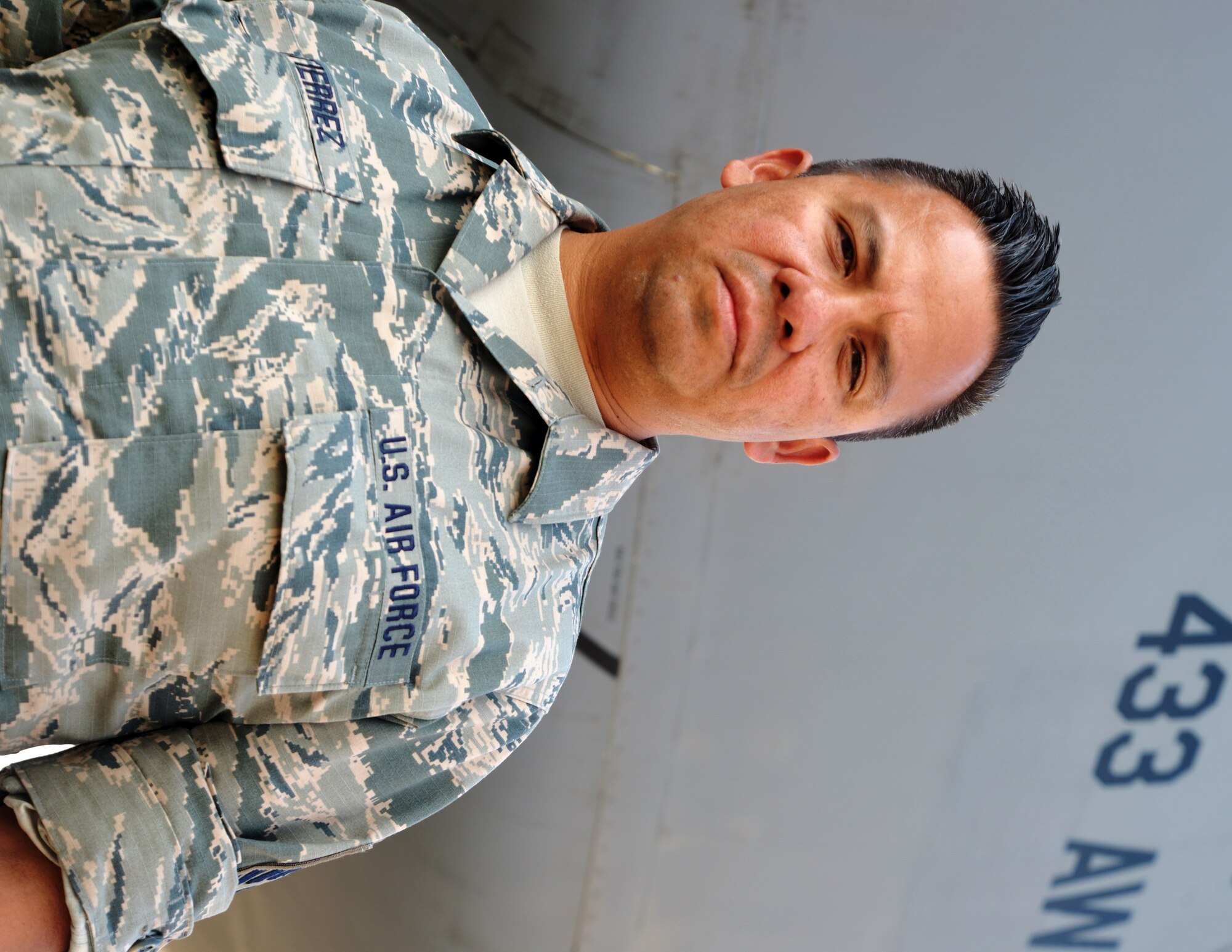 Master Sgt. Anthony Gutierrez, 433rd Aircraft Maintenance Squadron flying crew chief, works on an awaiting C-5A Galaxy aircraft Aug. 28, 2015 at Joint Base San Antonio-Lackland, Texas. MSgt. Gutierrez supported the evacuation and transport of evacuees during Hurricane Katrina. Aircraft Maintenance specialists are responsible for ensuring everything from tip to tail is maintained on the aircraft.   (U.S. Air Force photo by SrA Bryan Swink)(released)