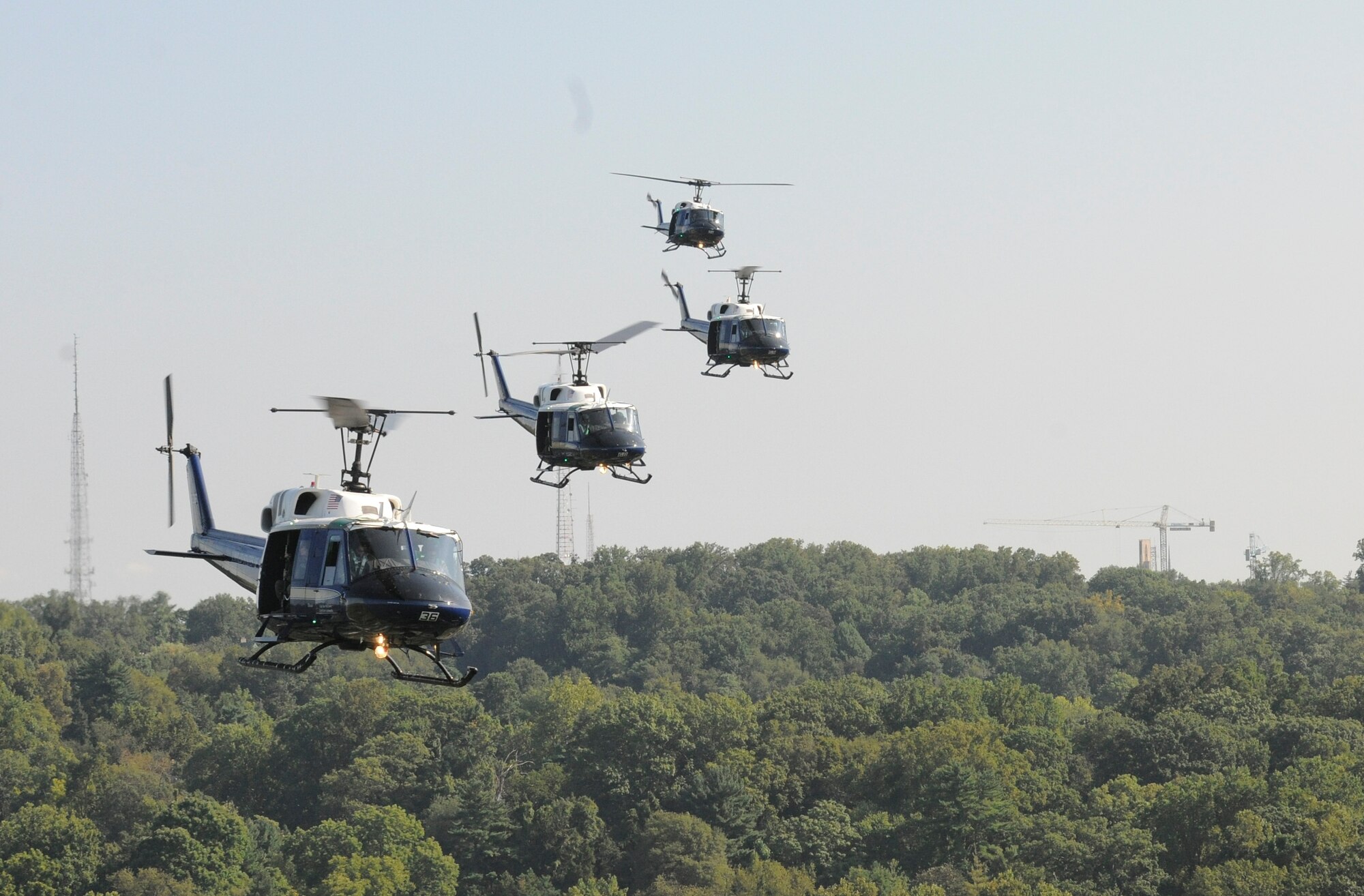 Four UH-1N Twin Hueys from the 1st Helicopter Squadron fly in formation over the National Capital Region, Aug. 28, 2015. The helicopters flew for the Vietnam Helicopter Crew Members Association Memorial Service Flyover. (U.S. Air Force photo/ Airman 1st Class J.D. Maidens)