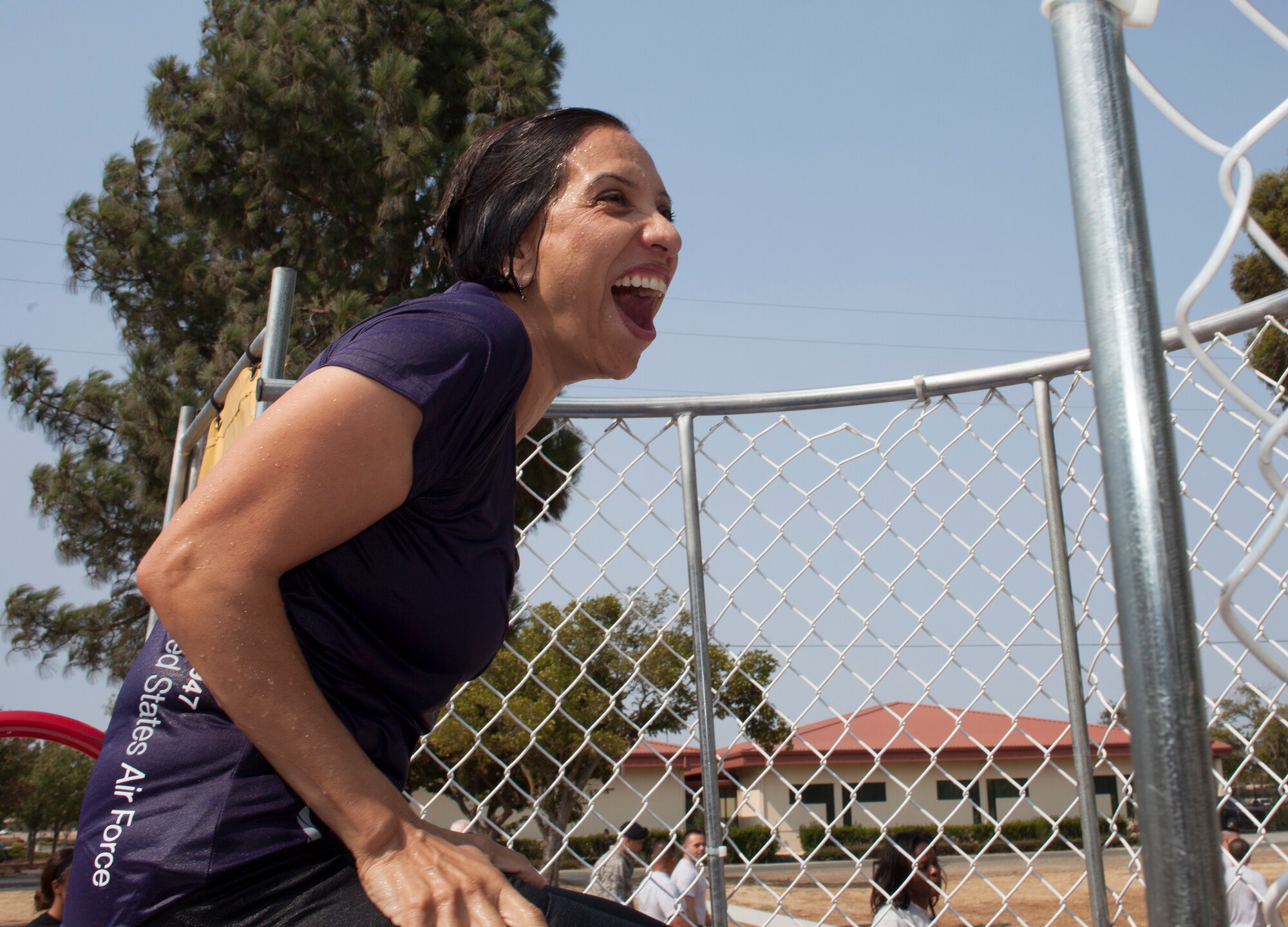 TRAVIS AIR FORCE BASE, Calif. -- Leaders from the 349th Air Mobility Wing took turns in the dunk tank Aug. 8, 2015 at Travis Air Force Base, Cailf., to promote esprit de corps and raise money for Airmen recognition activities.  (U.S. Air Force photo/Lt. Col. Robert Couse-Baker)