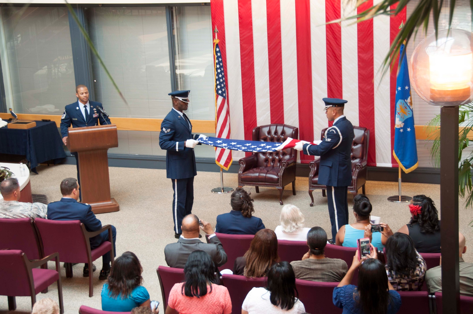 TRAVIS AIR FORCE BASE, Calif. -- Tech. Sgt. April Cofield, maintenance training manager, with the 349th Maintenance Group, retired after 21 years of military service, August 22, 2015. (U.S. Air Force photo/Staff Sgt. Cindy G. Alejandrez)