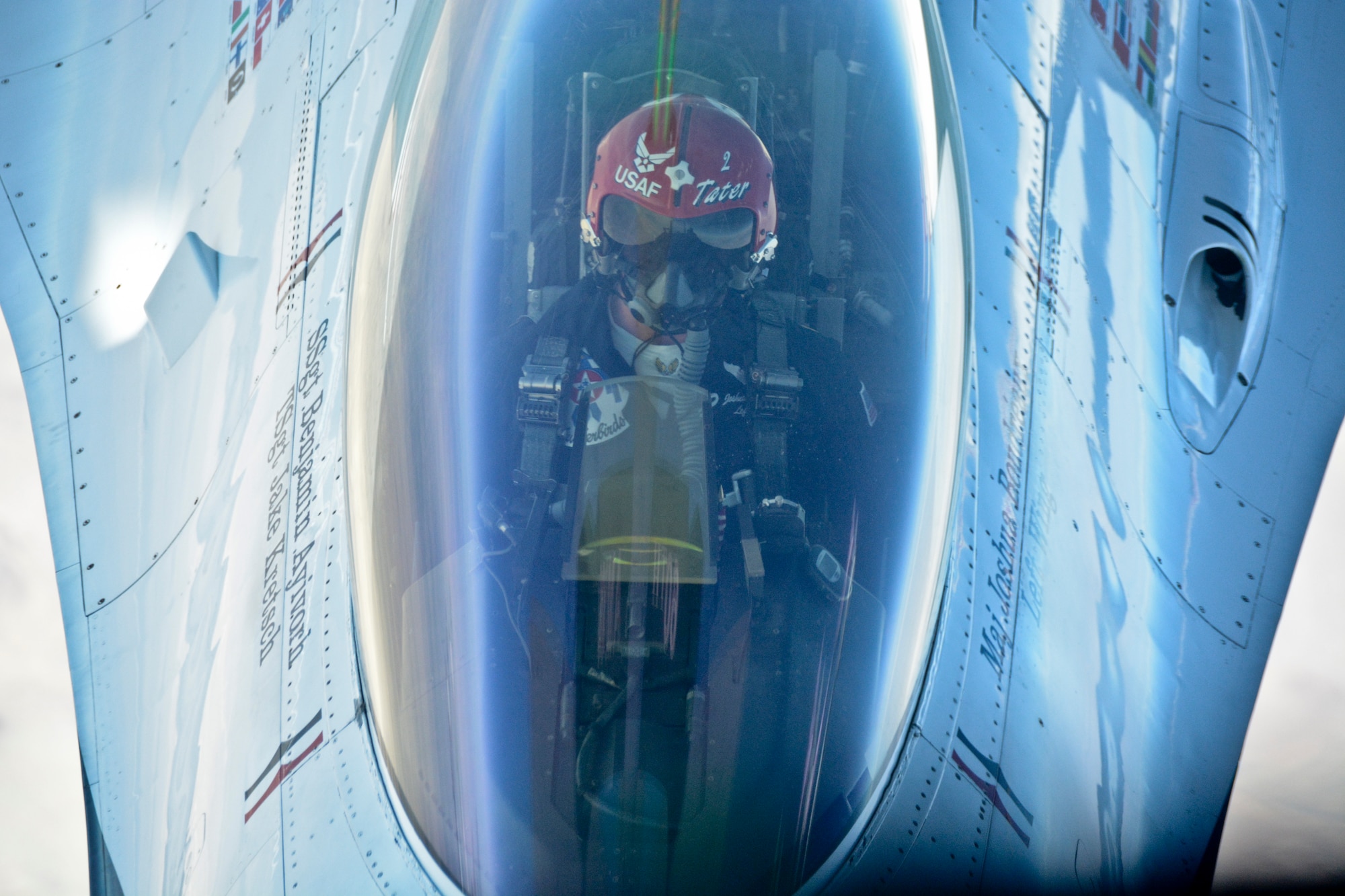 Maj. Joshua Boudreaux, U.S. Air Force Air Demonstration Squadron left wing pilot, pilots the number 2 jet Aug. 20 during the refuel over Nevada. (U.S. Air Force photo by Airman 1st Class Amber Carter)