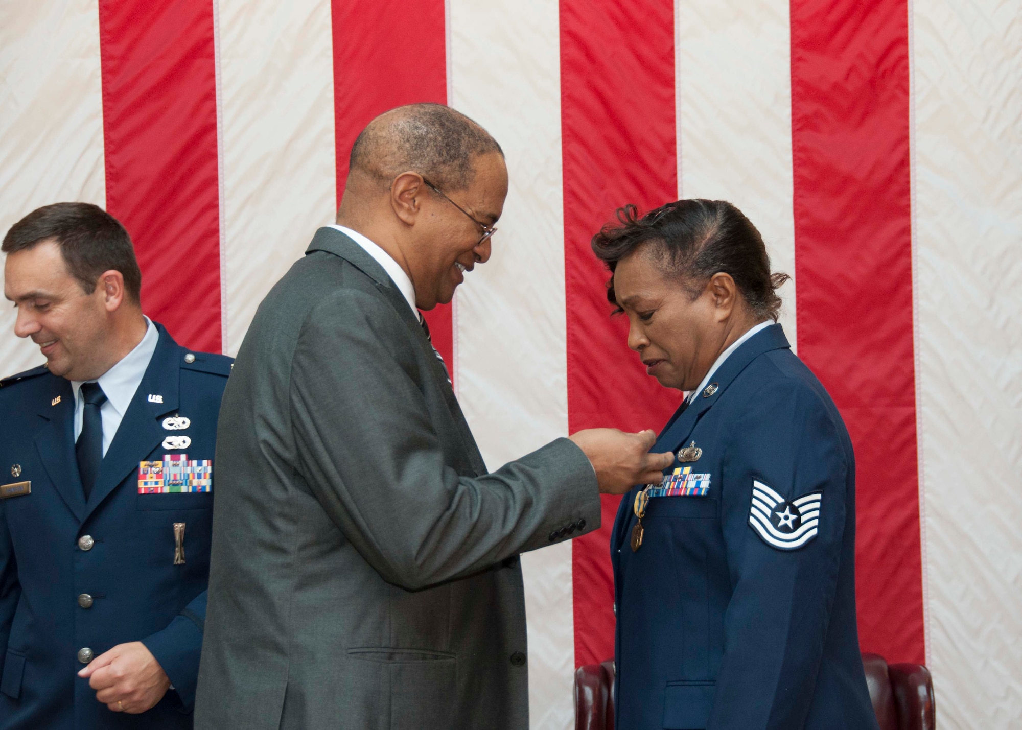 TRAVIS AIR FORCE BASE, Calif. -- Tech. Sgt. April Cofield, maintenance training manager, with the 349th Maintenance Group, retired after 21 years of military service, August 22, 2015. (U.S. Air Force photo/Staff Sgt. Cindy G. Alejandrez)