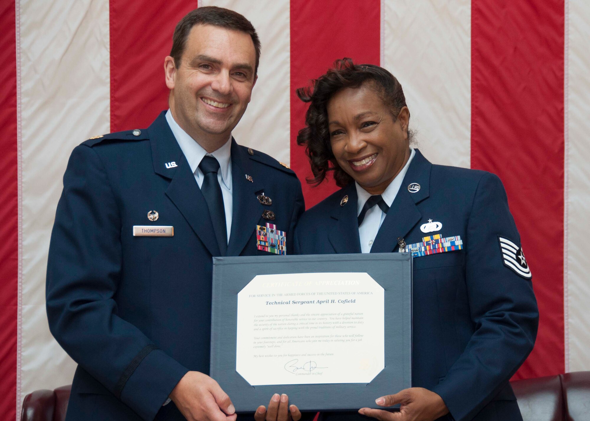 TRAVIS AIR FORCE BASE, Calif. -- Tech. Sgt. April Cofield, maintenance training manager, with the 349th Maintenance Group, retired after 21 years of military service, August 22, 2015. (U.S. Air Force photo/Staff Sgt. Cindy G. Alejandrez)