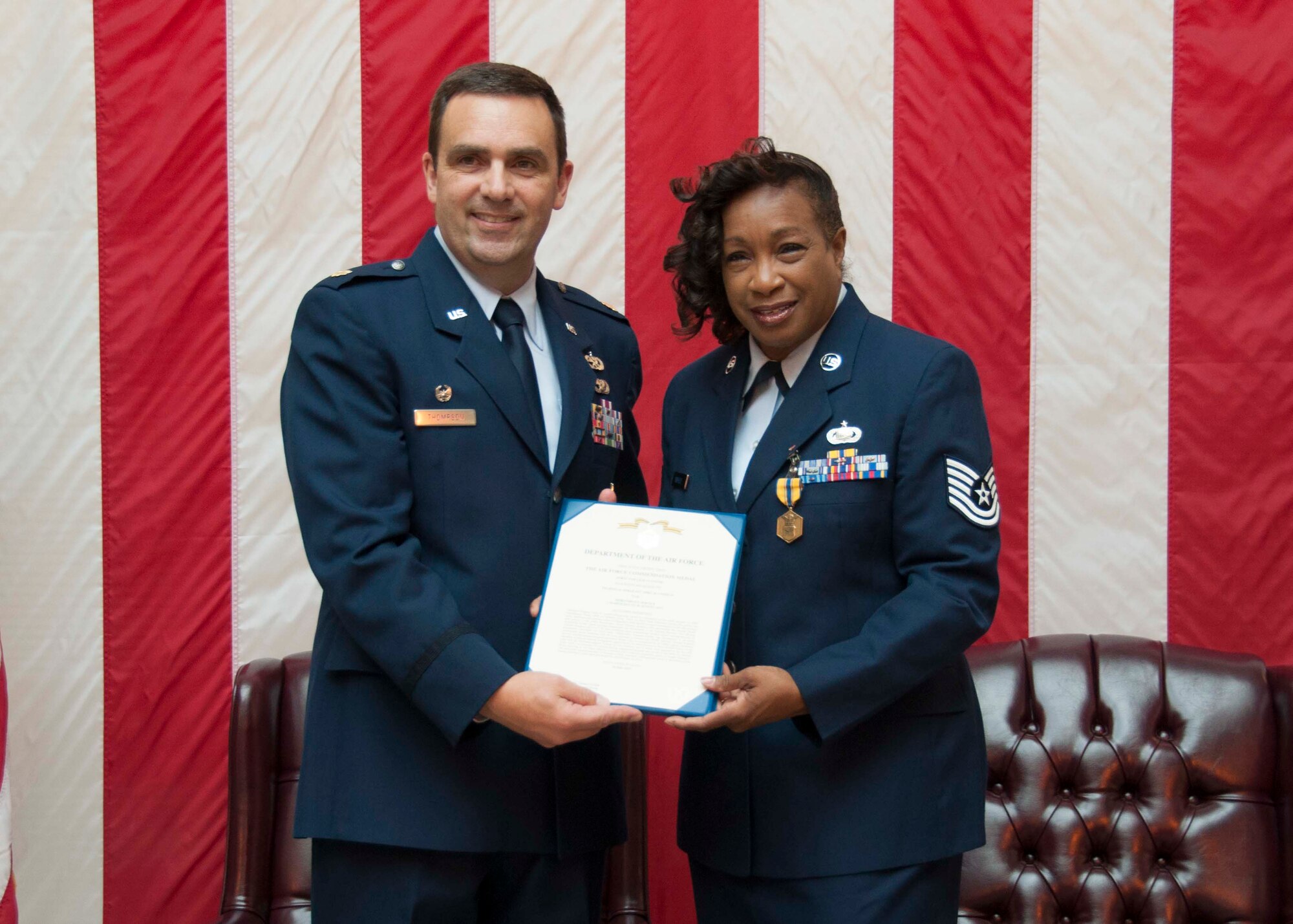 TRAVIS AIR FORCE BASE, Calif. -- Tech. Sgt. April Cofield, maintenance training manager, with the 349th Maintenance Group, retired after 21 years of military service, August 22, 2015. (U.S. Air Force photo/Staff Sgt. Cindy G. Alejandrez)