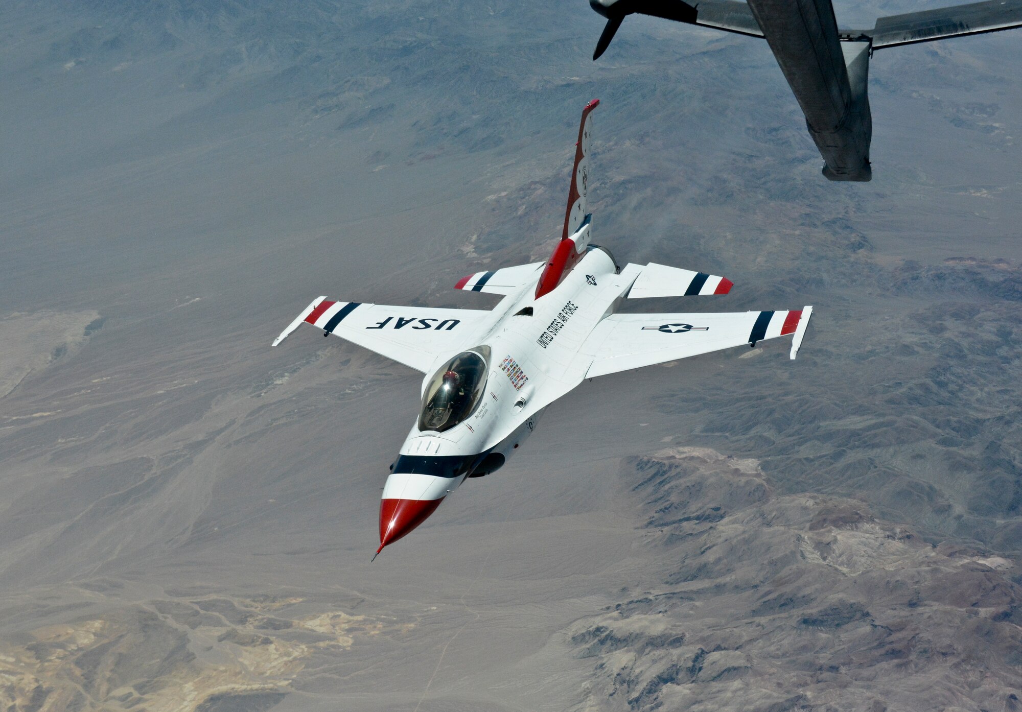 A Travis Air Force Base, Calif., KC-10 Extender refuels a Thunderbird Aug. 20 near Reno, Nev. (U.S. Air Force photo by Airman 1st Class Amber Carter)