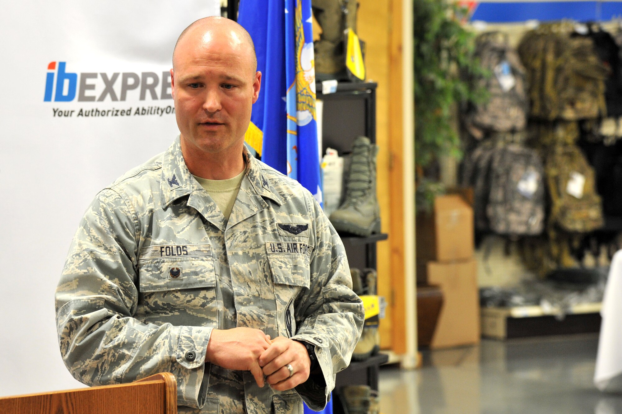 Col. Steven Folds, 341st Missile Wing vice commander, speaks during the Ability One Base Supply Program 20th anniversary ceremony Aug. 26, 2015, at Malmstrom Air Force Base, Mont. The Ability One program is the single largest source of jobs for individuals who are blind or have significant disabilities in the United States. (U.S. Air Force photo/John Turner)