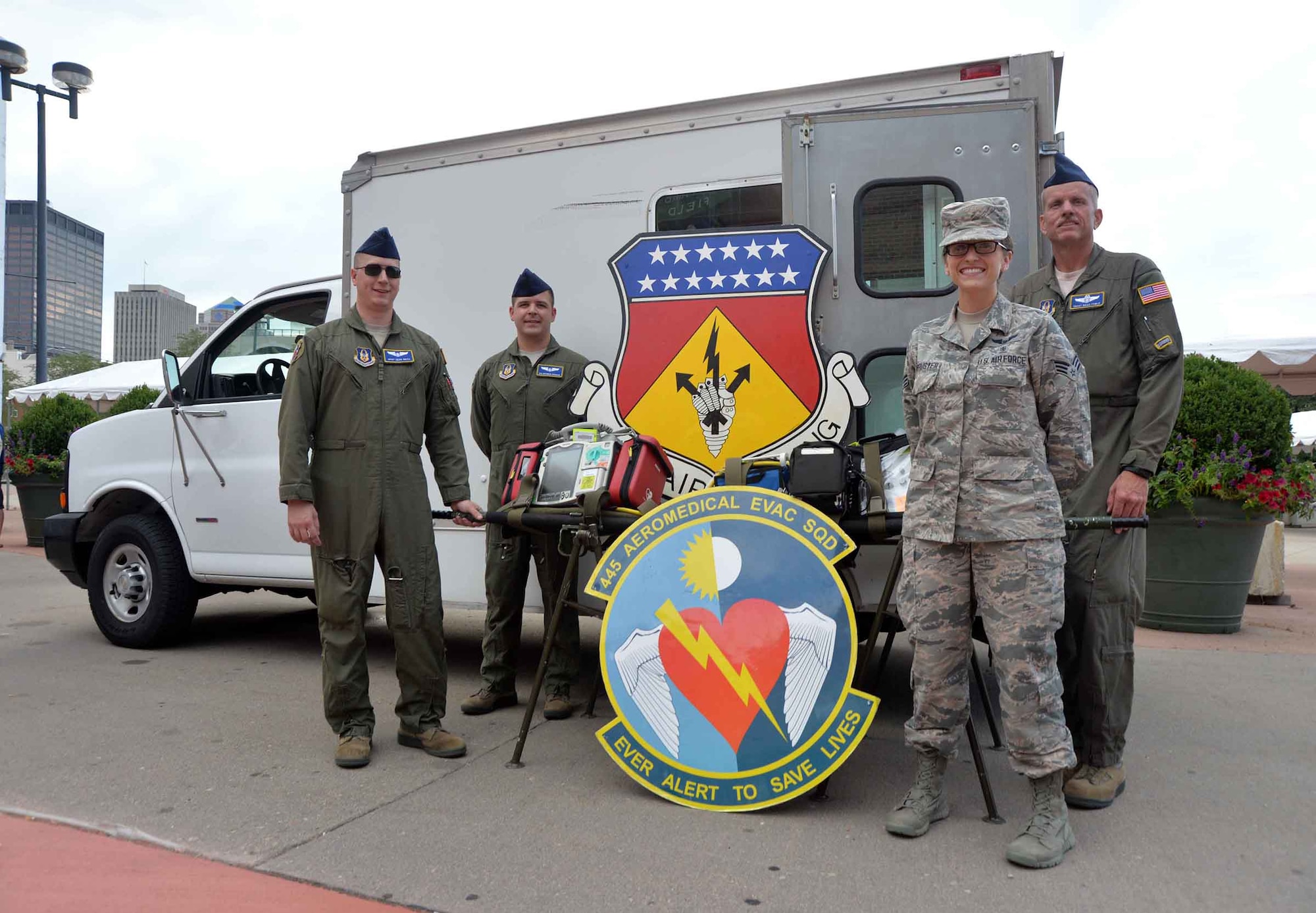 DAYTON, Ohio – 445th Aeromedical Evacuation Squadron Airmen Master Sgt. Sean Smith, Senior Airman Brandon Croghan, Senior Airman Valarie Armbruster and Chief Master Sgt. Brian Fowle participated in the Dayton Dragon’s Hometown Heroes Celebration Night at Fifth Third Field August 15, 2015. More than 8,000 minor league baseball fans had the opportunity to visit with the Airmen before the game and learn about the role they play in the 445th Airlift Wing and Air Force Reserve. (U.S. Air Force photo/Michelle Gigante)