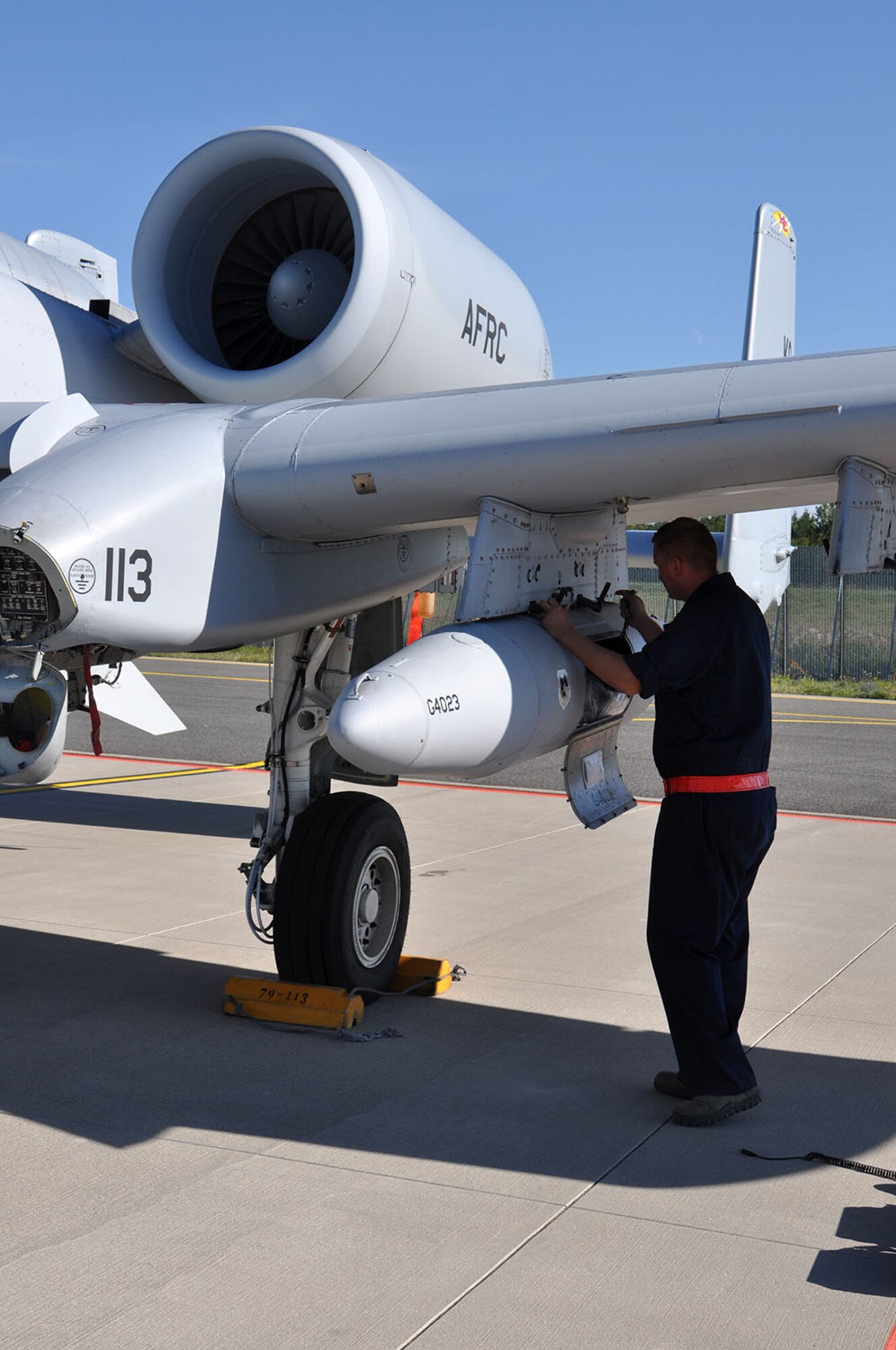 Senior Airman Ryan Jensen, a 442d Fighter Wing crew chief, works on the A-10 Thunderbolt II just after landing at Amari Air Base, Estonia Aug. 22 for Operation Atlantic Resolve.  Over the next three weeks, Air Force Reservists, active duty, and National Guard will train with the Estonian, Latvian and Lithuanian military forces. (U.S. Air Force photo by Capt. Denise Haeussler)