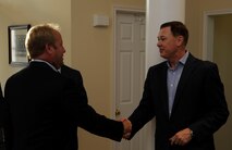 Air Force District of Washington Commander Maj. Gen. Darryl Burke welcomes Washington Redskins Senior Vice President of Operations Chris Bloyer to his residence on Joint Base Andrews, Md. August 27, 2015. Representatives from the Redskins organization where invited to the base as part of an initiative to increase public awareness and understanding of the Air Force, AFDW and Joint Base Andrews. (U.S. Air Force photo/Michael Martin)