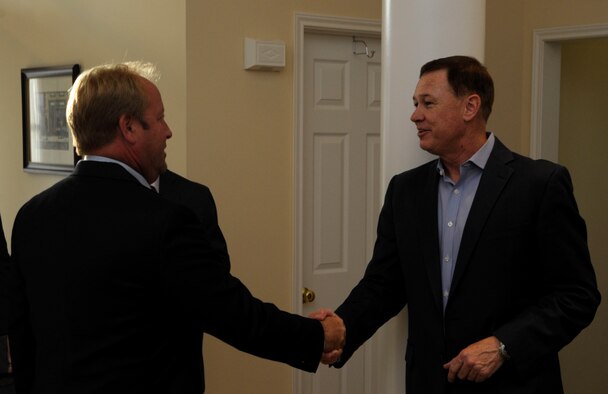 Air Force District of Washington Commander Maj. Gen. Darryl Burke welcomes Washington Redskins Senior Vice President of Operations Chris Bloyer to his residence on Joint Base Andrews, Md. August 27, 2015. Representatives from the Redskins organization where invited to the base as part of an initiative to increase public awareness and understanding of the Air Force, AFDW and Joint Base Andrews. (U.S. Air Force photo/Michael Martin)