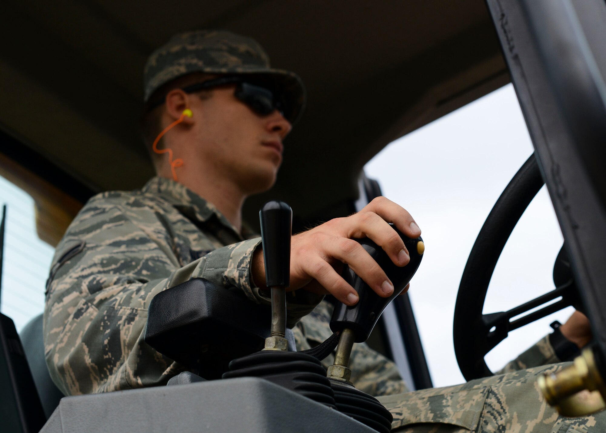 U.S. Air Force Airman 1st Class Seth Netherland, 31st Civil Engineer Squadron explosive ordnance disposal apprentice, operates a 10k all-terrain forklift during a monthly prime base engineer emergency force, or Prime BEEF, training exercise, Aug. 25, 2015, at Aviano Air Base, Italy. After receiving forklift training, participants are qualified to use the equipment instead of relying on another flight to provide assistance. (U.S. Air Force photo by Senior Airman Austin Harvill/Released)