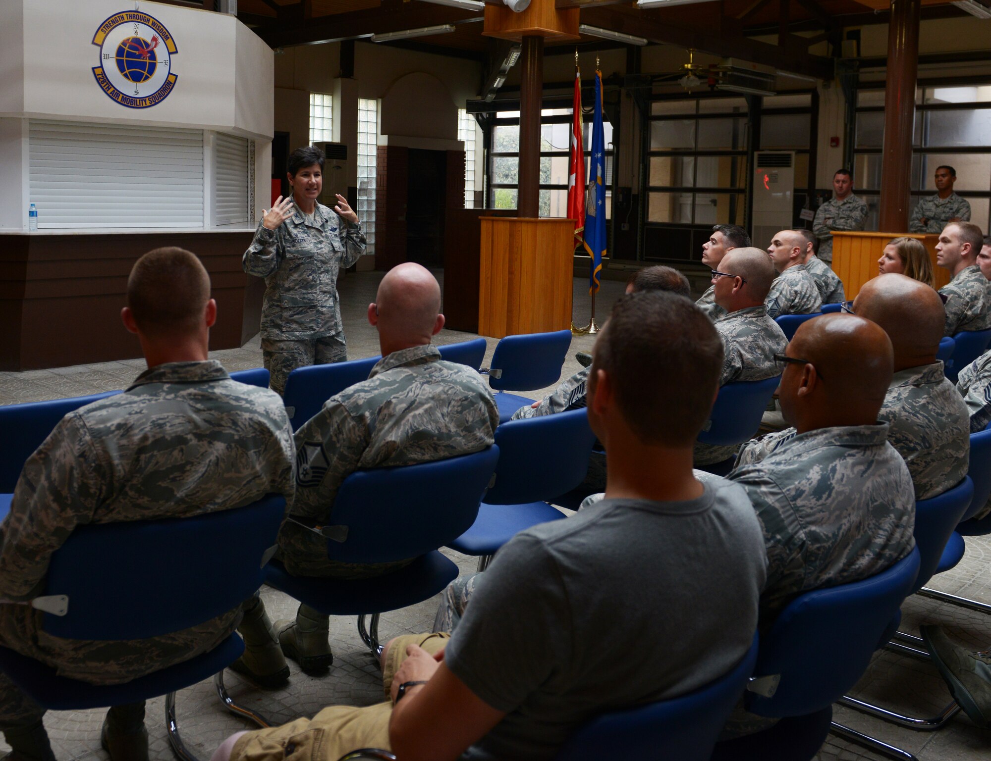 Col. Nancy Bozzer, 521st Air Mobility Operations Wing commander, speaks with Airmen of the 728th Air Mobility Squadron during an all-call Aug. 24, 2015, at Incirlik Air Base, Turkey. During her visit, Bozzer toured 728th AMS facilities, observed the squadron’s capabilities and interacted with Airmen throughout the day. (U.S. Air Force photo by Senior Airman Krystal Ardrey/Released)