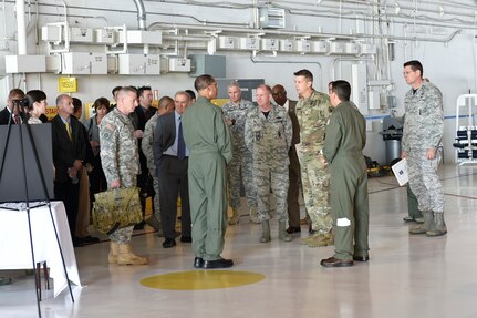 U.S. Navy Adm. Cecil D. Haney (center left), U.S. Strategic Command commander, and U.S. Air Force Lt. Gen. Stephen W. Wilson (center right), USSTRATCOM deputy commander, engage in modernization discussions with their staff and other senior defense and government officials during their visit to Peterson Air Force Base, Colo., Aug. 28, 2015. Haney and members of his staff traveled to Peterson AFB to participate in a National Nuclear Command, Control and Communications (NNC3) modernization demonstration, which highlighted future global situation monitoring and decision-making capabilities for national senior leaders on the nation's NNC3 platforms. As the unified combatant command charged with executing the U.S.'s strategic deterrence mission, USSTRATCOM partners closely with the Joint Staff, North American Aerospace Defense Command - U.S. Northern Command, and other defense and government agencies to provide the nation with a safe, secure and effective nuclear deterrent force. In addition to strategic deterrence, USSTRATCOM is also charged, through the Unified Command Plan, with space operations; cyberspace operations; joint electronic warfare; global strike; missile defense; intelligence, surveillance and reconnaissance; combating weapons of mass destruction; and analysis and targeting. (Photo courtesy of Jhomil Bansil, NORAD - USNORTHCOM public affairs)