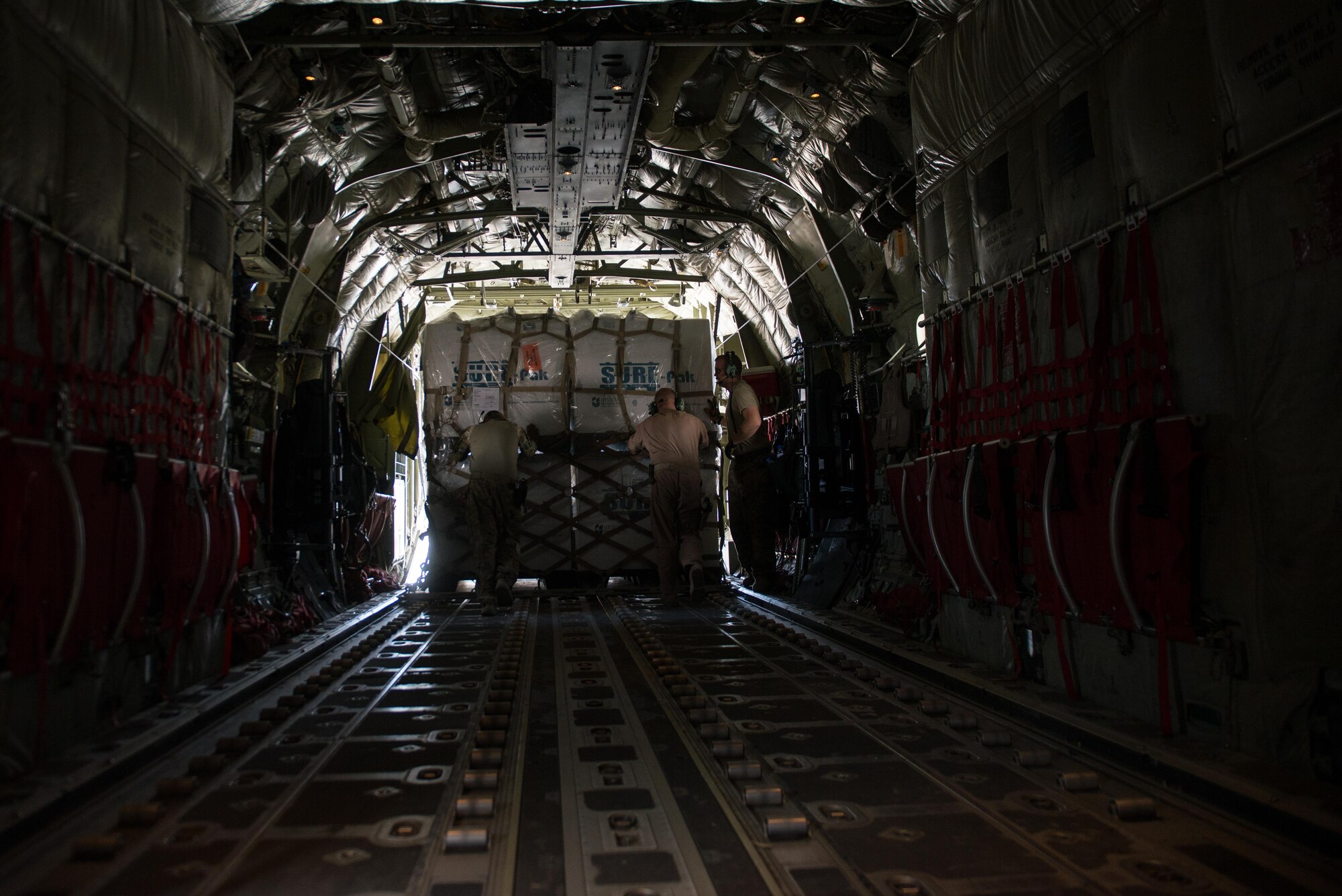 U.S. Airmen assigned to the 455th Air Expeditionary Wing unload cargo from an Air Force C-130J Super Hercules aircraft at Camp Dwyer, Afghanistan, Aug. 27, 2015. The aircrafts short takeoff and landing capability makes it an optimum fit for Afghanistan’s rugged terrain. (U.S. Air Force photo by Tech. Sgt. Joseph Swafford/Released)