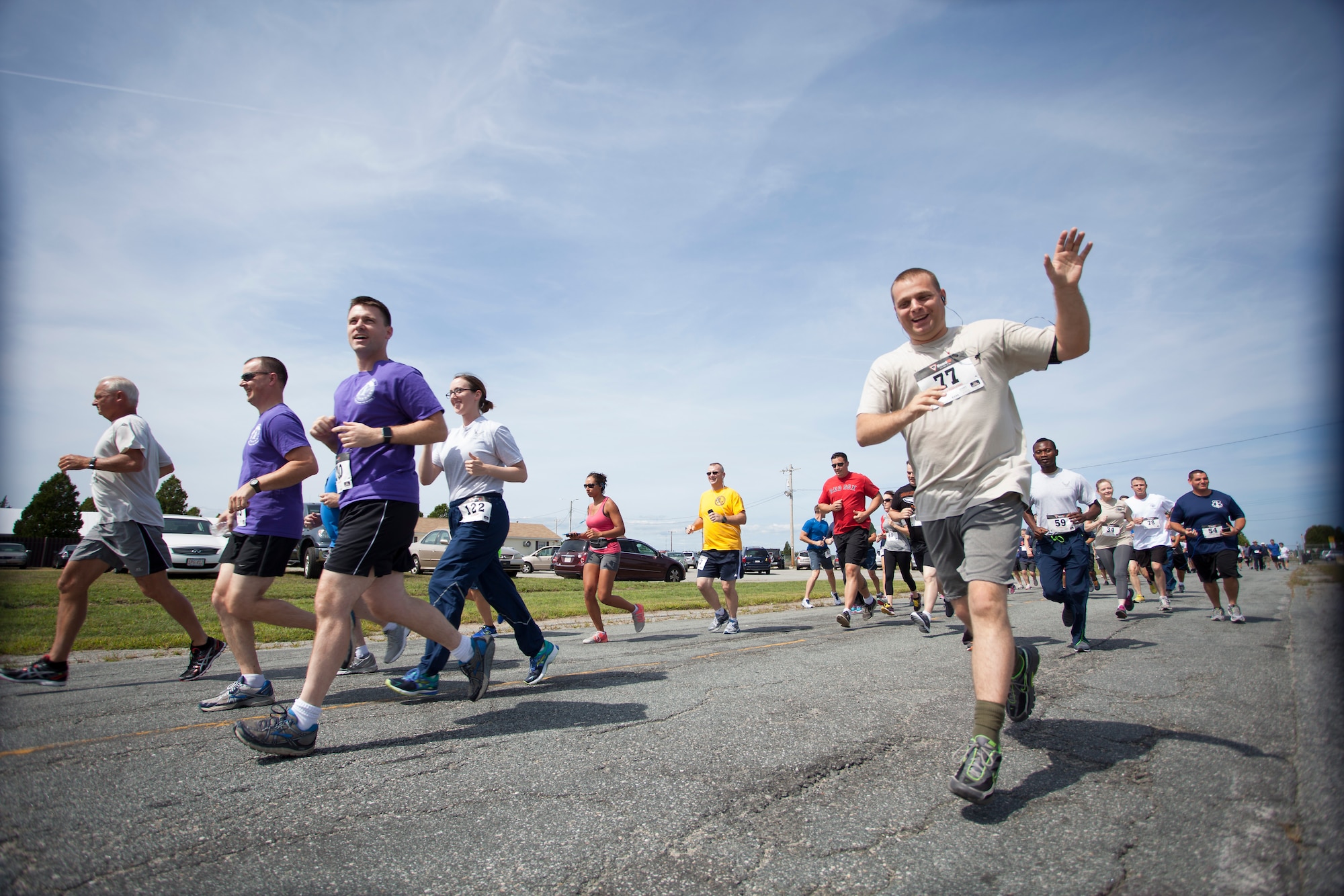 On August 29, 2015 the 102nd Intelligence Wing held its first Sexual Assault Prevention and Response 5k. The Awareness run was a mix of runners and walkers speeding along South Outer Road, allowing those involved to engage in some friendly competition and show their support for Sexual Assault Prevention and Response. (Air National Guard photo by Staff Sgt. Jeremy Bowcock)