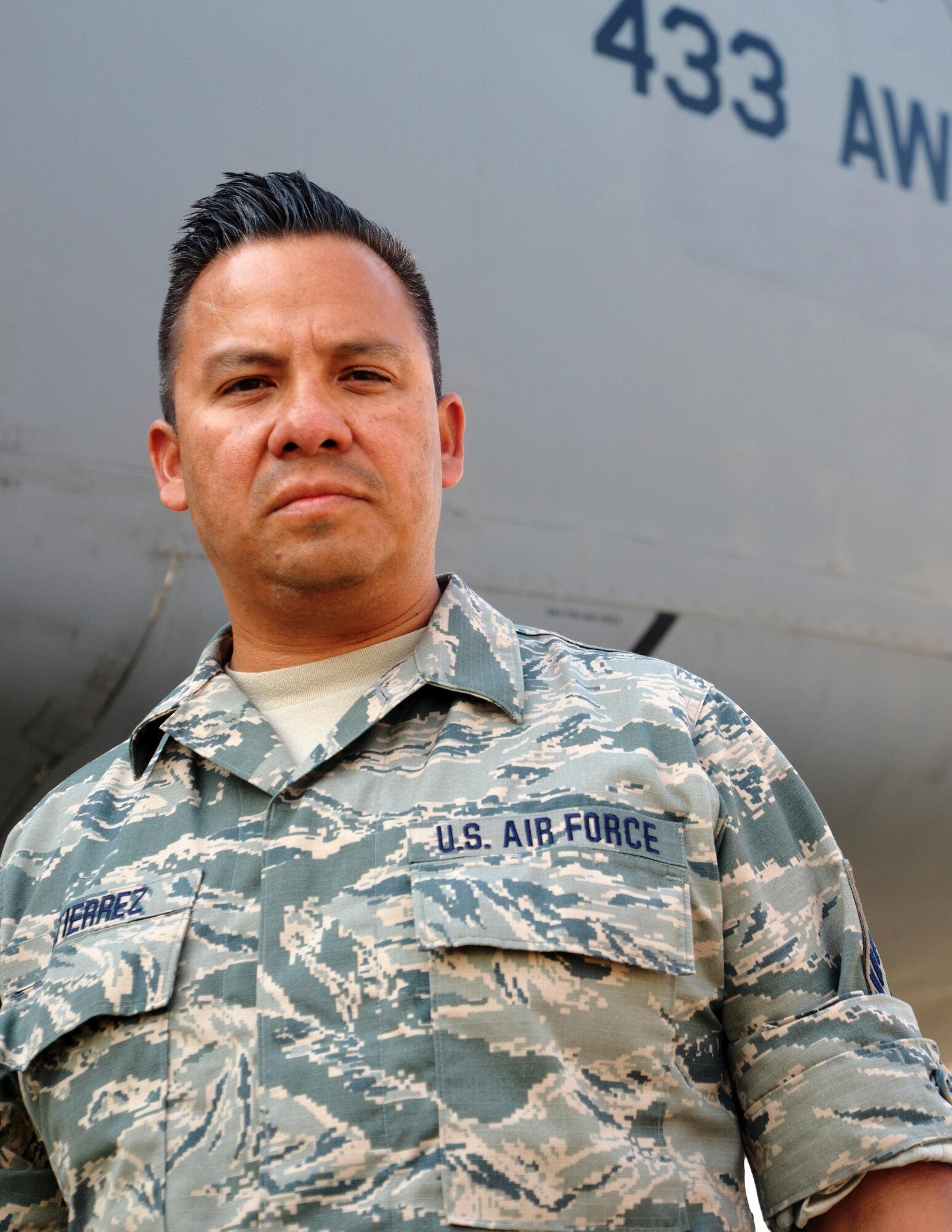 Master Sgt. Anthony Gutierrez, 433rd Aircraft Maintenance Squadron flying crew chief,  Joint Base San Antonio-Lackland, Texas, supported the evacuation and transport of evacuees during Hurricane Katrina. (U.S. Air Force photo by SrA Bryan Swink )