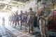 Members of the 5th Quartermaster Theater Aerial Delivery Company prepare to jump from a C-130 from the 934th Airlift Wing for an airdrop at Ramstein AB, Germany. (U.S. Air Force photo by Staff Sgt. Trevor Saylor)