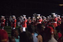 The U.S. Marine Corps Band performs during an evening parade at Marine Barracks Washington, D.C., Aug. 21, 2015. The Honorable Mr. Andy Berke, Mayor of Chattanooga, the Honorable Mr. Earl Anthony ‘Tony’ Reavley, Director of Hamilton County Emergency Services & Homeland Security, and the Honorable Mr. Fred Fletcher, Chief of Police, Chattanooga Police Department, were the guests of honor for the parade, and Lt. Gen. Richard P. Mills, commander, Marine Forces Reserve, Marine Forces North, was the hosting official. The Evening Parade began in 1934 and features the Silent Drill Platoon, the U.S. Marine Band, the U.S. Marine Corps Drum and Bugle Corps, and two marching companies. More than 3500 guests attend the parade every week. (U.S. Marine Corps photo by Lance Cpl. Kayla V. McTaw/Released)
