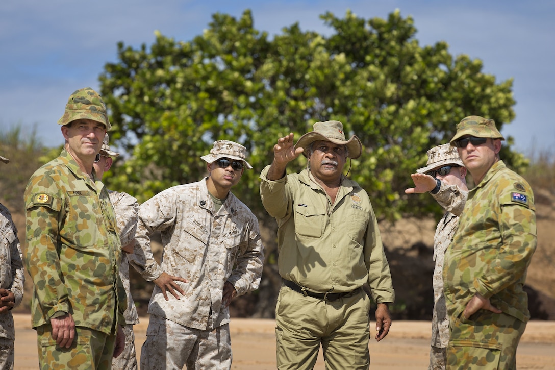 A Indigenous Larrakia Nation representative Eric Fejo (center) advises Australian Army and United States Marine Corps personnel on heritage concerns for Exercise Talisman Sabre 2015, at Fog Bay Northern Territory. (Royal Australian Army photo by Lance Cpl. Kyle Genner/Released)