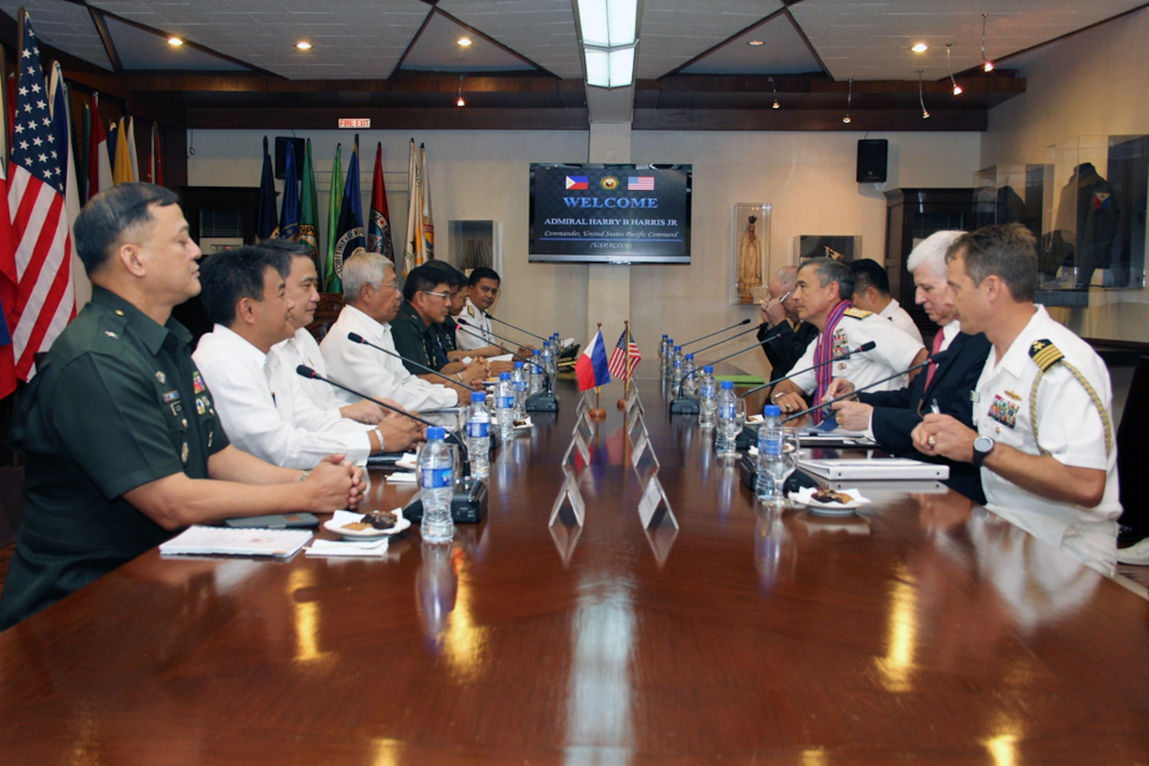 MANILA, Philippines (Aug. 25, 2015) -  Commander of U.S. Pacific Command, Adm. Harry B. Harris, center right, met with Secretary of National Defense, the honorable Voltaire Gazmin, center left, and staff members during an office call at the Department of National Defense. During Harris’ visit they discuss a variety of operations and exercises. 