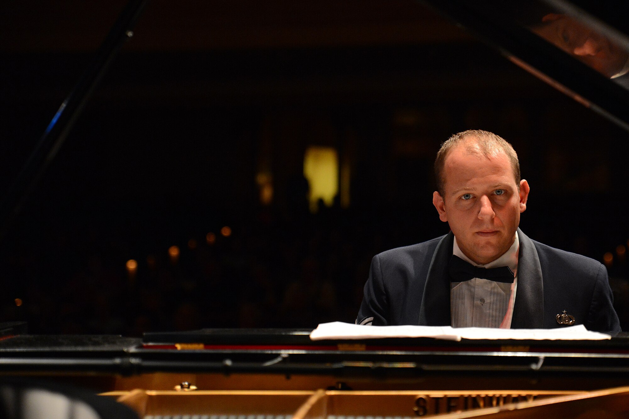 Staff Sgt. Brandon May, Air Force Band of the Golden West piano player, performs at a concert in Astoria Ore. August 30, 2015. The Band of the Golden West is comprised of several performing groups: Concert Band, Ceremonial Marching Band, Commanders jazz ensemble, Mobility popular music ensemble, Travis Brass quintet, Golden West Winds woodwind quintet, Wild West Winds clarinet quartet, and The Blue Yonders folk-rock band. (U.S. Air Force photo by Tech Sgt. Sean Tobin)