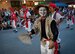 A chondara clown greets and entertains the crowd at a Kadena Town Eisa Festival in Kadena Cho, Japan, Aug. 29, 2015. Eisa festivals are held after Obon, a three-day Okinawan holiday which celebrates life and welcomes the spirits of ancestors home for a family reunion. (U.S. Air Force photo by Master Sgt. Jason W. Edwards)