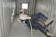 U.S. Air Force Staff Sgt. Jeret Kinnaird, firefighter for the North Carolina Air National Guard, 145th Civil Engineer Squadron, rappels down a simulated elevator shaft during fire rescue training at the 145th Civil Engineer Regional Training Site, New London, N.C. Kinnaird, who on July 22, 2015, was presented with the “Chief Albert Fitzpatrick Award” for Firefighter of the Year for 2014, is an instructor for ANG Rescue Technician I and II Courses. (U.S. Air National Guard photo by Master Sgt. Patricia F. Moran, 145th Public Affairs/Released)