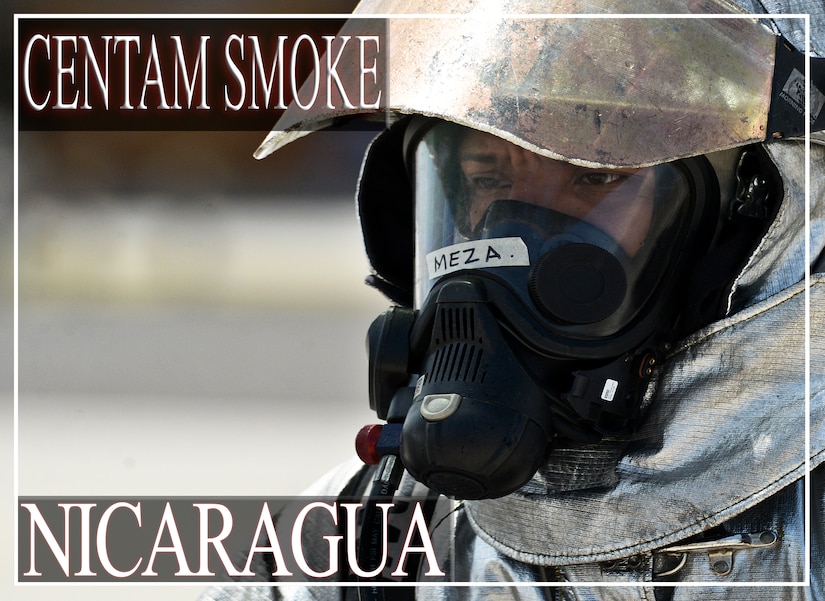 Joshoa Moises Meza Casaya, a firefighter from Nicaragua, prepares to execute his knowledge during mobile aircraft firefighting training during the CENTAM SMOKE exercise Aug. 28, 2015, at Soto Cano Air Base, Honduras. The exercise, known as Central America Sharing Mutual Operational Knowledge and Experience, or "CENTAM SMOKE," brings together U.S. and Central American firefighters to train and improve their ability to work together. (U.S. Air Force illustration by Staff Sgt. Jessica Condit)