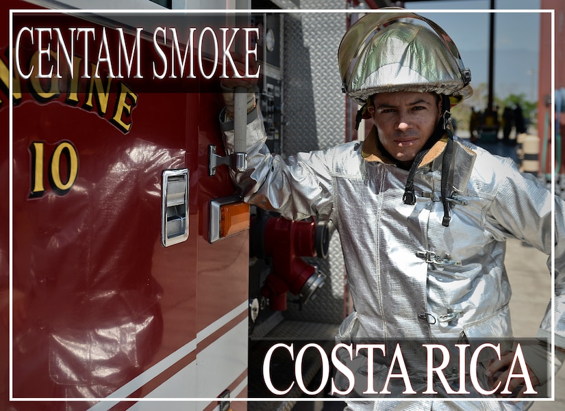 Donald Gerardo Avila Montoya, who has been a firefighter in Costa Rica for more than 10 years, pauses for a photo opportunity during the CENTAM SMOKE exercise Aug. 28, 2015, at Soto Cano Air Base, Honduras. The exercise, known as Central America Sharing Mutual Operational Knowledge and Experience, or "CENTAM SMOKE," brings together U.S. and Central American firefighters to train and improve their ability to work together. (U.S. Air Force illustration by Staff Sgt. Jessica Condit)