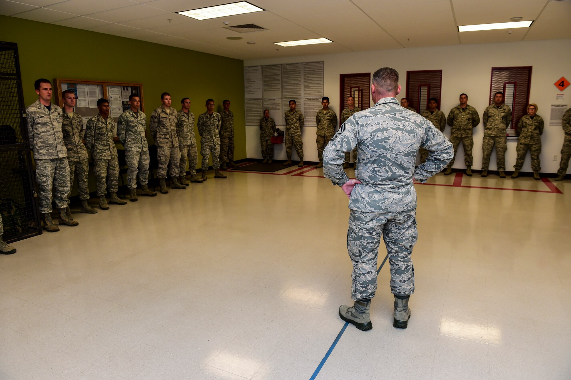 Chief Master Sgt. Patrick McMahon, Air Force Space Command command chief, speaks with members of the 460th Mission Support Group Aug 28, 2015, at the security forces building on Buckley Air Force Base, Colo. McMahon visited Buckley AFB for the first time after becoming the senior enlisted leader of Air Force Space Command, communicating his goals, answering Airman’s questions and recognizing outstanding performers. (U.S. Air Force photo by Senior Airman Phillip Houk/Released)