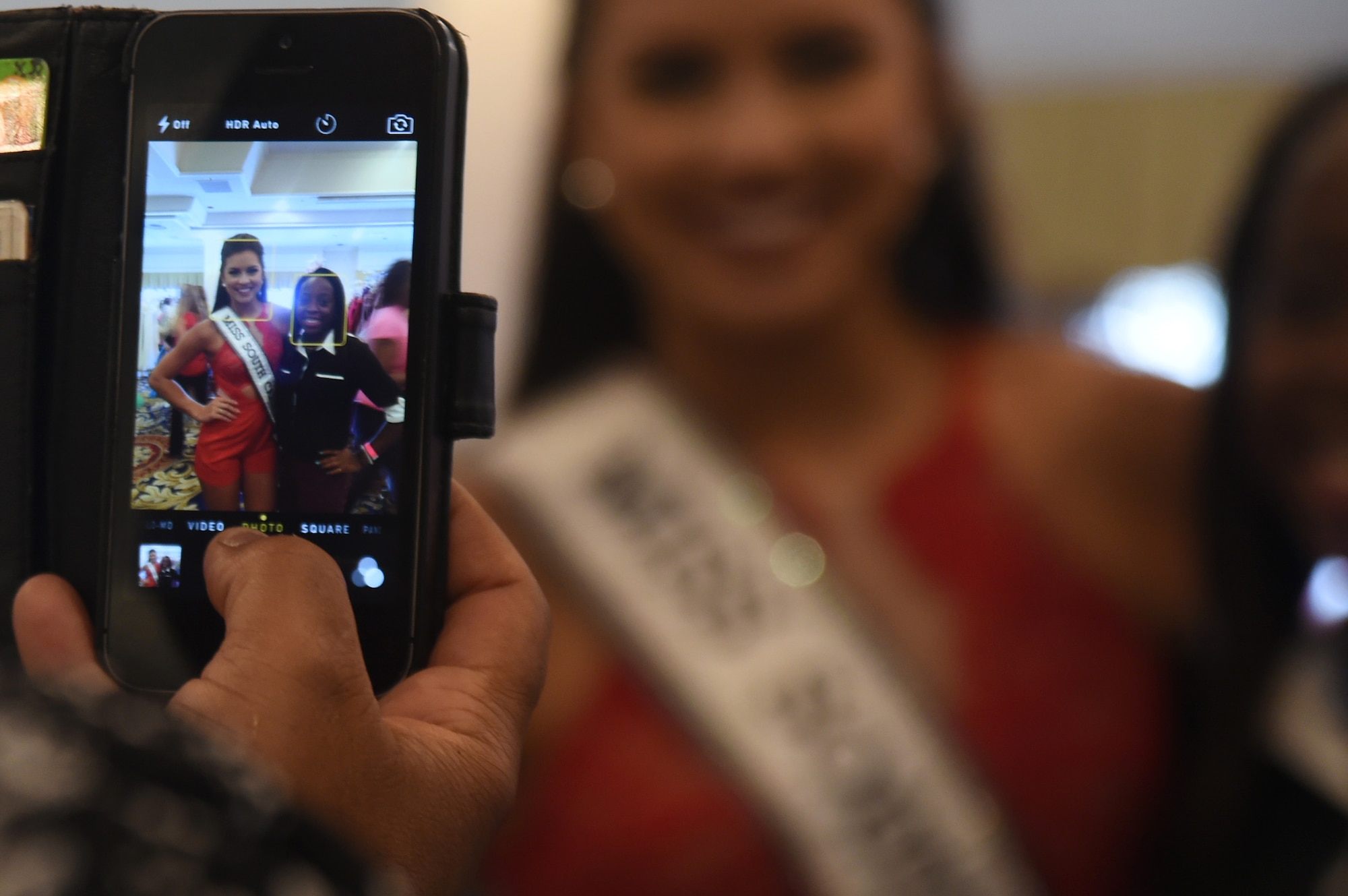 Sarah Hamrick, 2015 Miss South Carolina Teen poses with a military dependent during the USO sponsored Operation That’s My Dress event in Las Vegas, Aug. 30, 2015. More than 1500 dresses in multiple sizes- valued between $400 and $1200-were donated to over 800 active duty females, spouses, and teenage daughters as a thank you for their service. (U.S. Air Force photo by Tech. Sgt. Nadine Barclay)