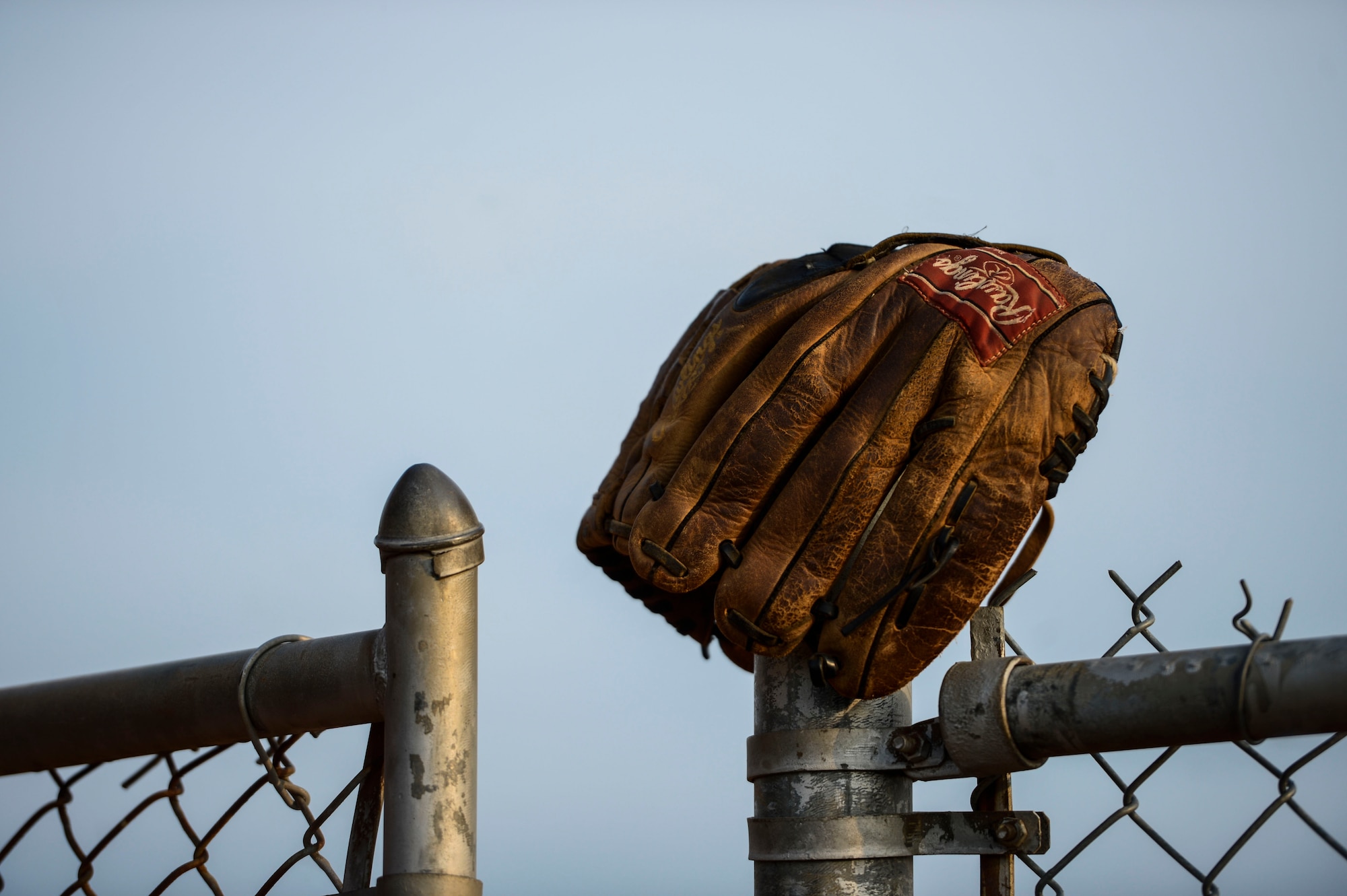 The 633rd Civil Engineer Squadron and the 45th Intelligence Squadron competed during the 2015 Intramural Softball Championship at Langley Air Force Base, Va., Aug. 25, 2015. U.S. Air Force Col. Caroline Miller, 633rd Air Base Wing commander, hosted the game and presented the winners with a trophy. (U.S. Air Force photo by Senior Airman Kayla Newman/Released)