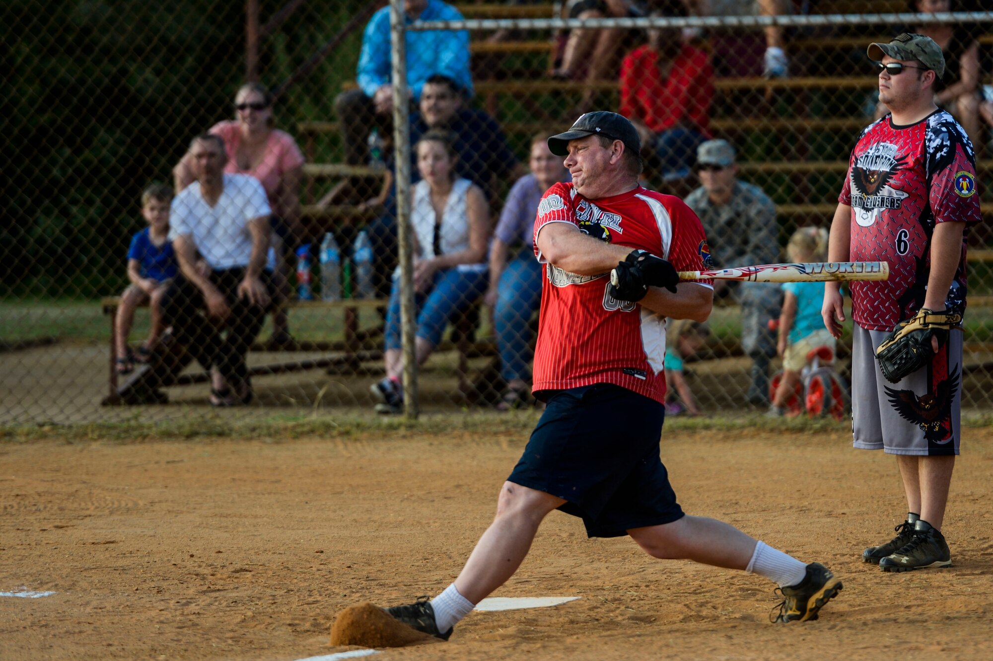 Joseph Sirois, member of the 633rd Civil Engineer Squadron softball team, takes a swing during the 2015 Intramural Softball Championship at Langley Air Force Base, Va., Aug. 25, 2015. The 633rd CES team was defeated by the 45th Intelligence Squadron with a score of eight runs to seven. (U.S. Air Force photo by Senior Airman Kayla Newman/Released)