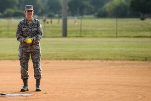 U.S. Air Force Col. Caroline Miller, 633rd Air Base Wing commander, prepares to throw out the first pitch of the 2015 Intramural Softball Championship at Langley Air Force Base, Va., Aug. 25, 2015. The 633rd Civil Engineer Squadron and the 45th Intelligence Squadron competed for the championship title. (U.S. Air Force photo by Senior Airman Kayla Newman/Released)