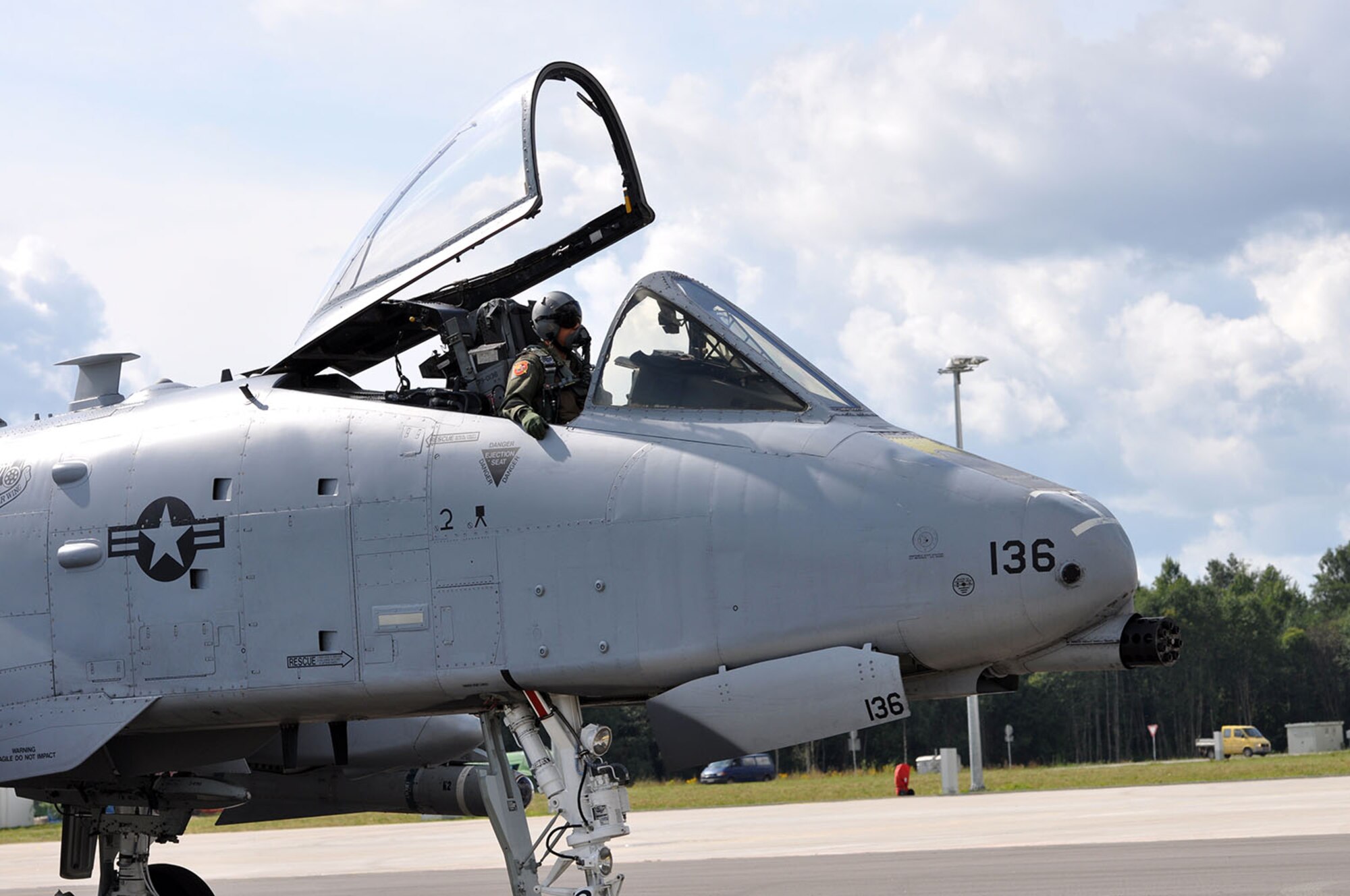 Maj. Rick Mitchell, an A-10 Thunderbolt II pilot with the 303d Fighter Squadron, 442d Fighter Wing out of Whiteman Air Force Base, Mo. rolls to a stop at Leilvarde Air Base Aug. 26.  Mitchell made history being the first U.S. fighter pilot to land at the air base as he participates in Operation Atlantic Resolve. (U.S. Air Force photo by Capt. Denise Haeussler)