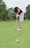 HORSHAM AIR GUARD STATION, Pa. – Never a doubt as Lt. Col. John Commins, chief of wing safety with the 111th ATKW, sinks his 18th hole putt during the Friends of the Family Readiness charity golf outing held at the Pinecrest Golf Club, Montgomeryville, Pa., Aug. 31, 2015. The best ball, scramble event brought together nearly 50 unit members and civilians for a day of fun and summertime leisure. (U.S. Air National Guard photo by Master Sgt. Christopher Botzum/Released)