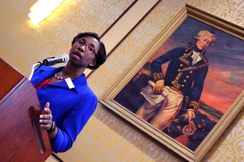 Kady-Ann Davy, Fayetteville mayor pro tem, provides remarks as the guest speaker during an observance for Women’s Equality Day Aug. 26, 2015, at the Catering and Conference Center Fort Bragg, North Carolina. Women’s Equality Day is a symbol of women’s continued fight for equal rights and that the United States commends and supports them. Today, it is celebrated in honor of modern day women's rights to be seen as equals to men. (U.S. Air Force photo/Marvin Krause)