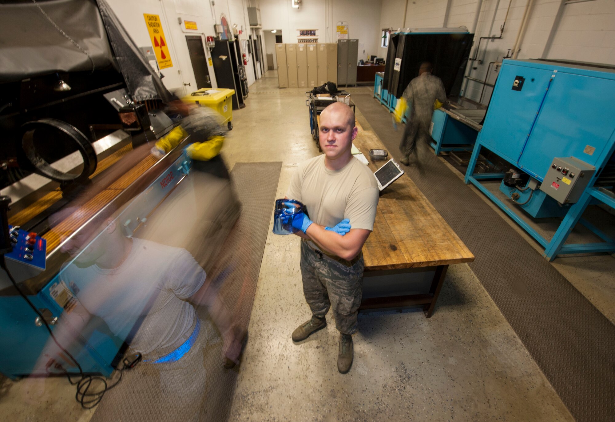 Senior Airman Kyle Abendroth, 5th Maintenance Squadron non-destructive inspection journeyman, poses for a photograph at Minot Air Force Base, N.D., Aug. 26, 2015. NDI Airmen are able to use X-rays, chemical developers, black lights and magnetism to detect deficiencies in aircraft and ground equipment parts without having to further damage them. (U.S. Air Force photo/Senior Airman Stephanie Morris)